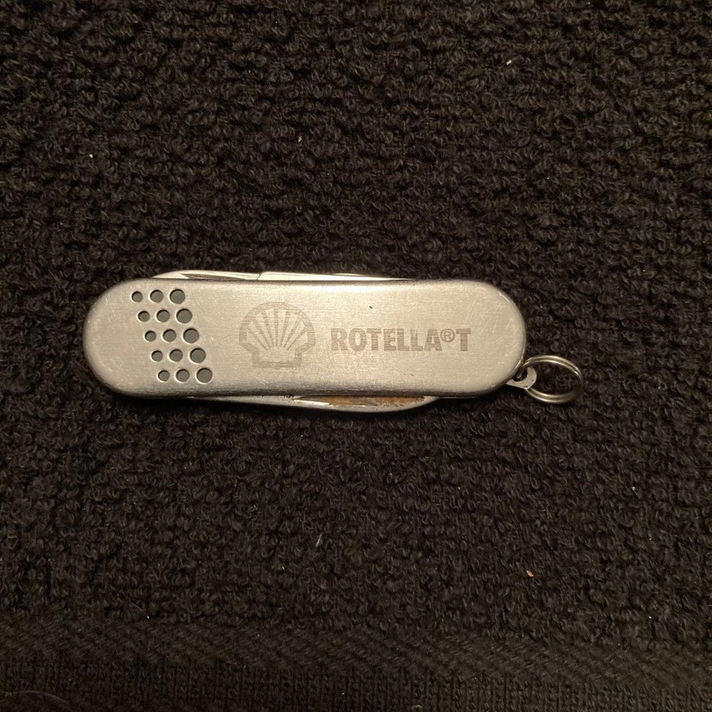 Vintage Shell “Rotella” Oil Pocket Grooming Tool.